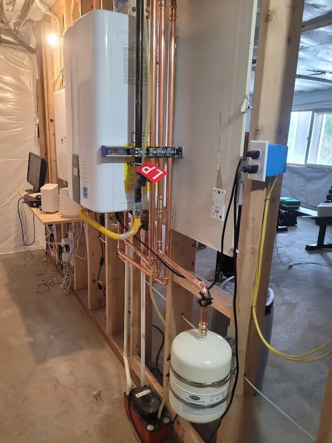 Licensed plumber repairing a kitchen sink in Seabrook